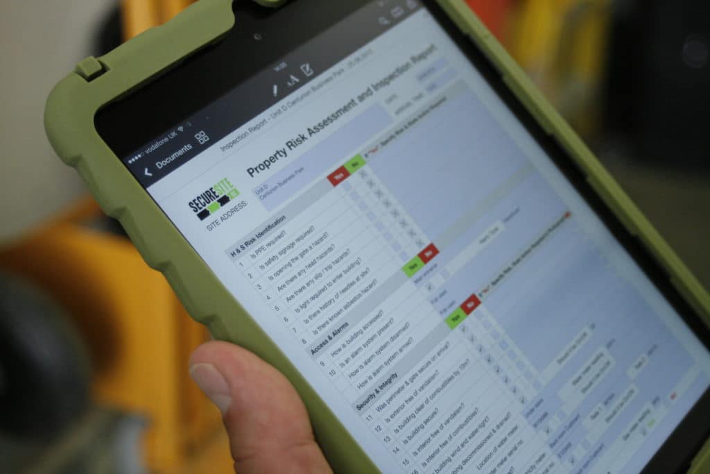 Secure Site UK vacant property inspections software displayed on a tablet